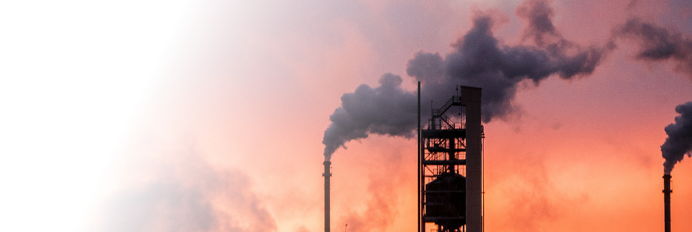 Image of an oil refinary at sunset